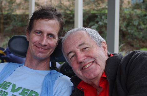Matthew with Dad. This was taken at Matthew's first trip home as a surprise for two hours for Luke's birthday. 