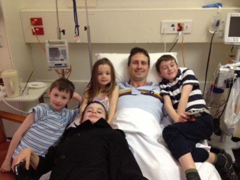 A week later, and he's still all smiles but feeling much better and happy to share the bed.